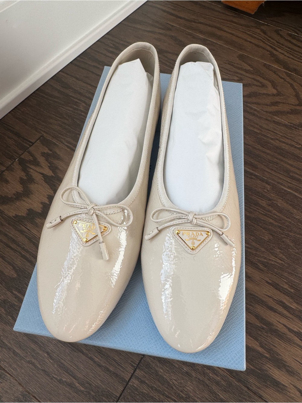 Prada Cream Patent Leather Ballet Flats with Gold Logo